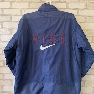 Nike vintage puffer installed big logo jacket