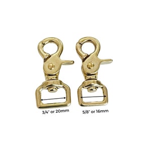 May include: Two gold-toned metal swivel snap hooks. The larger hook measures 5/8 inch or 16 mm. The smaller hook measures 3/4 inch or 20 mm.