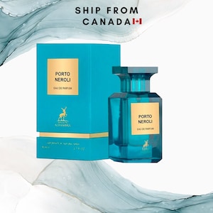 May include: A turquoise perfume bottle and box set. The box and bottle feature the text "PORTO NEROLI EAU DE PARFUM". The bottle has a square shape with a matching turquoise cap. The box has a gold label with a deer logo.