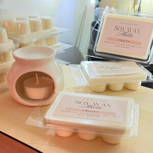 Wax burner with soy wax melts on wooden tray, cozy relaxation home scent