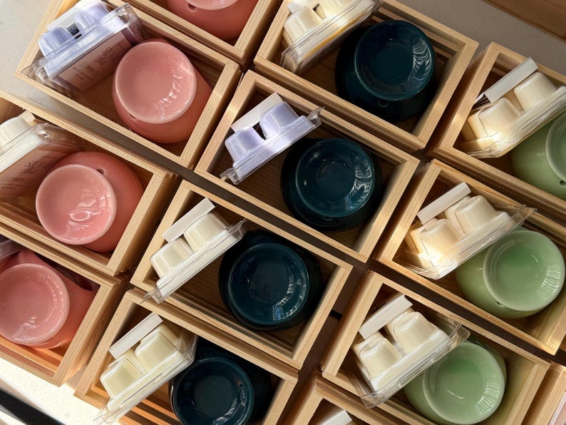 Soy wax melts with ceramic wax melters arranged in wooden boxes, natural home fragrance set