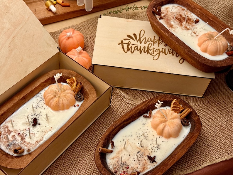 Handmade wooden dough bowl pumpkin candle with soy wax and dried botanicals, perfect as an autumn candle or pumpkin candle gift. Rustic design enhances autumn home decor and autumn decorations, while warm fragrance makes it an ideal Thanksgiving candle. Use as pumpkin decor, cozy centerpiece, or thoughtful Thanksgiving gifts. Unique handmade candles for Thanksgiving decor and seasonal charm, reusable rustic bowl.