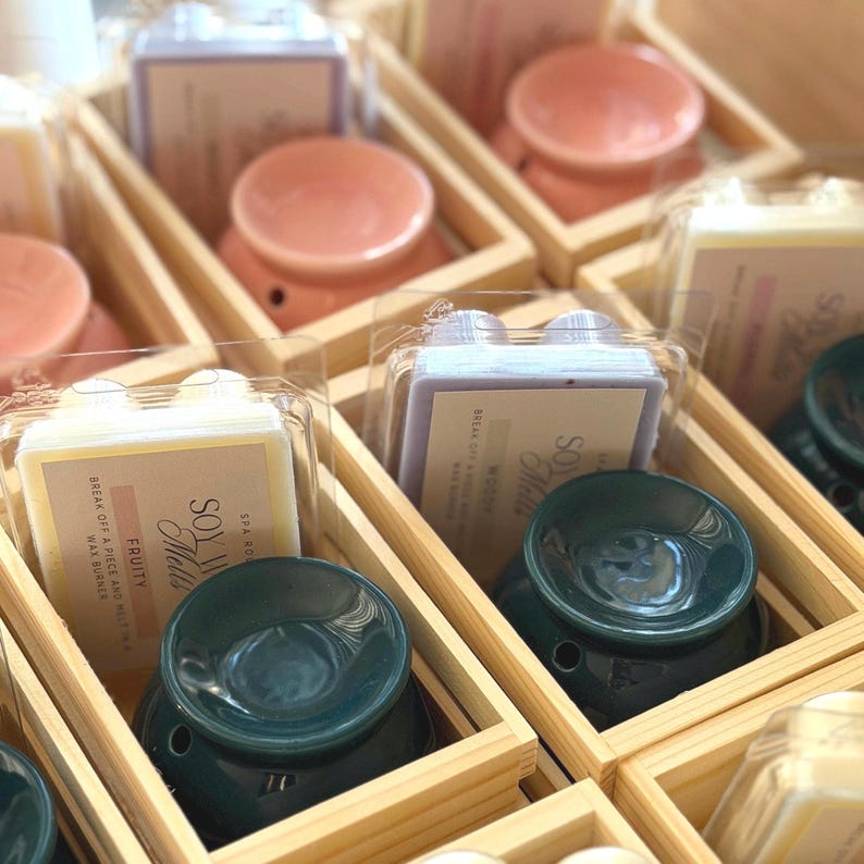 Soy wax melts with ceramic wax melters arranged in wooden boxes, natural home fragrance set
