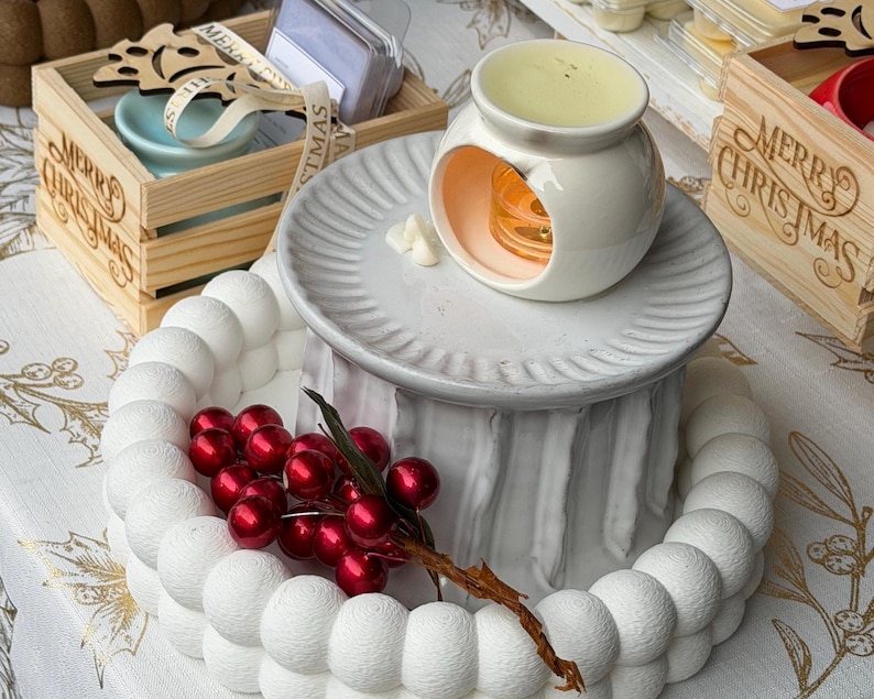 Placing soy wax melts into ceramic wax burner, easy aromatherapy home fragrance use
