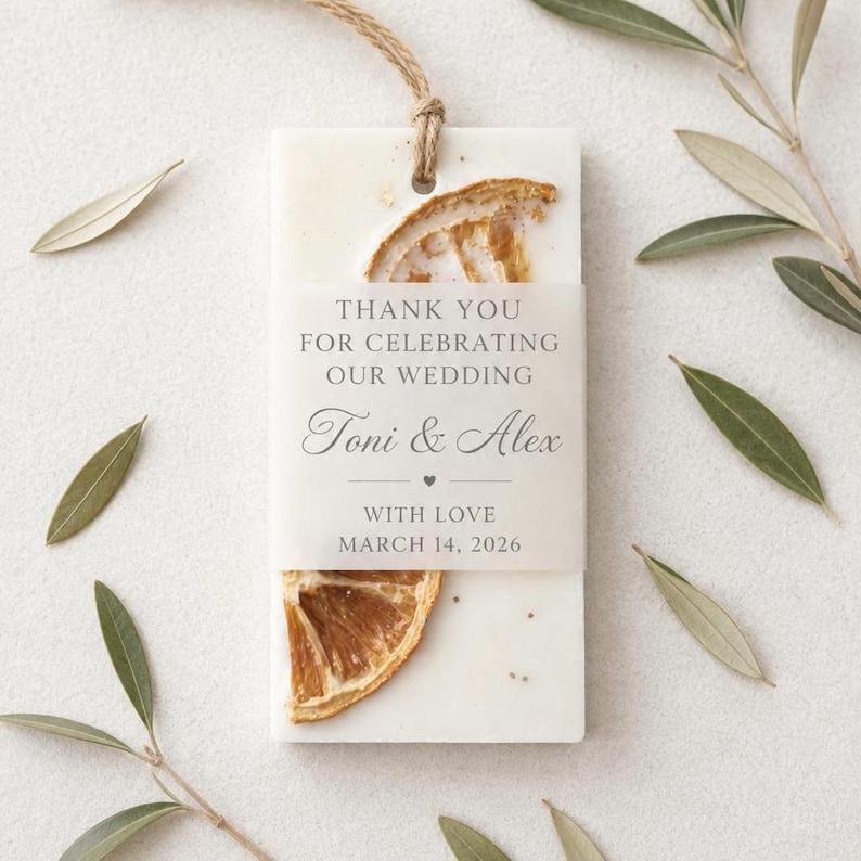 Personalized burnt orange soy wax sachet favors featuring dried orange slices, handmade soy wax air fresheners and custom vellum labels with names and dates. Elegant wedding favors, bridal shower favors, baby shower gifts, engagement party favors and wedding guest favors. Neutral boho decor with natural botanicals and premium fragrance oils. Perfect for wedding welcome bags, bridesmaid gifts, bridal events and special celebrations.