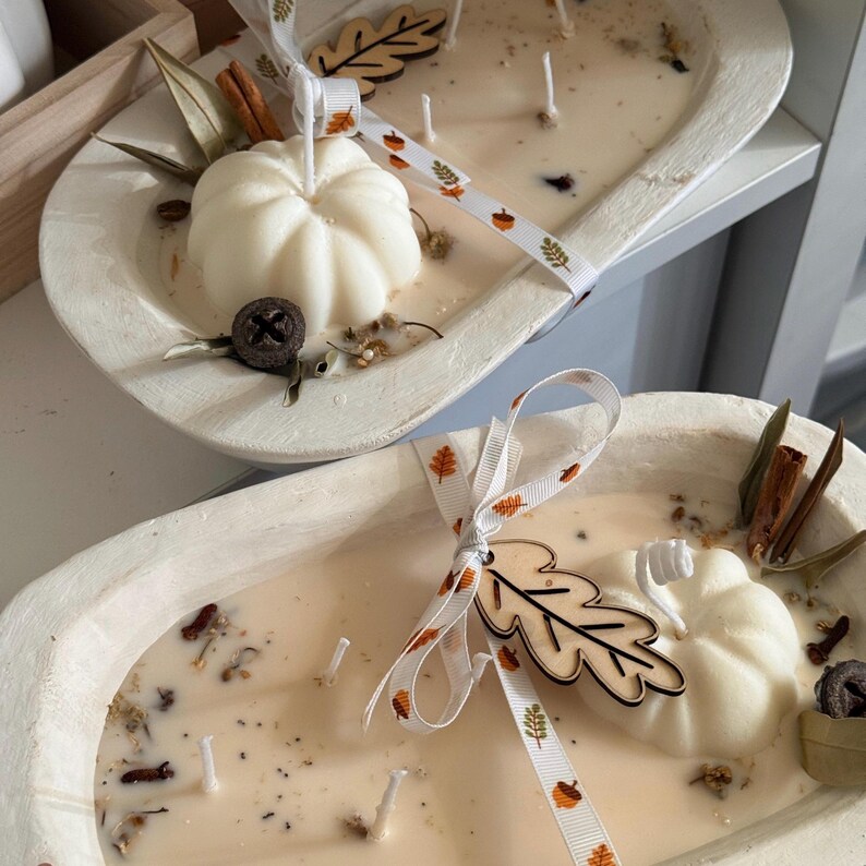 Handmade wooden dough bowl pumpkin candle with soy wax and dried botanicals, perfect as an autumn candle or pumpkin candle gift. Rustic design enhances autumn home decor and autumn decorations, while warm fragrance makes it an ideal Thanksgiving candle. Use as pumpkin decor, cozy centerpiece, or thoughtful Thanksgiving gifts. Unique handmade candles for Thanksgiving decor and seasonal charm, reusable rustic bowl.