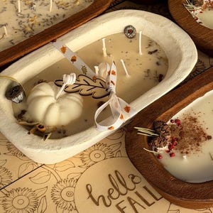 Handmade wooden dough bowl pumpkin candle with soy wax and dried botanicals, perfect as an autumn candle or pumpkin candle gift. Rustic design enhances autumn home decor and autumn decorations, while warm fragrance makes it an ideal Thanksgiving candle. Use as pumpkin decor, cozy centerpiece, or thoughtful Thanksgiving gifts. Unique handmade candles for Thanksgiving decor and seasonal charm, reusable rustic bowl.