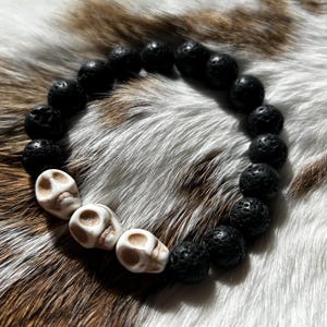 Three Skulls Lava Stone Beaded Stretch Bracelet