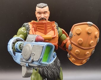 ManAtArms Figurenzubehör Pack: Schild, Kopf, Blaster