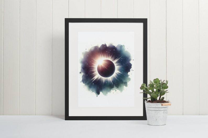 May include: A framed watercolour painting of a solar eclipse with a black sun and a white halo against a dark blue and purple background with white stars.
