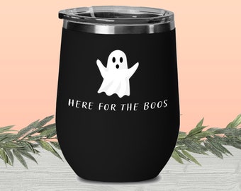 May include: Black stainless steel wine tumbler with a white ghost graphic and the text "Here for the boos".