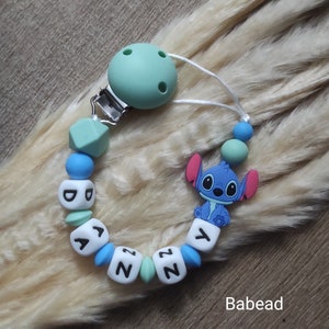 Personalized blue mint green stitch style pacifier clip with first name