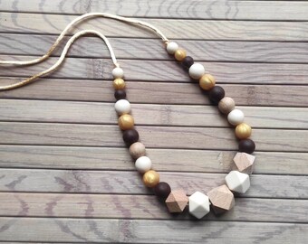 Breastfeeding and bottle-carrying necklace silicone wood awakening beige golden brown