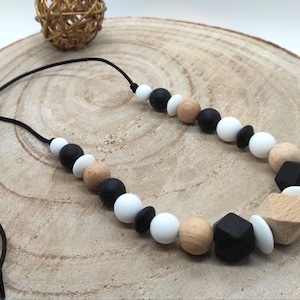 Nursing and bottle carrying necklace silicone wood awakening in black and white