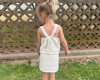 Ollies boho-strandkleding. Haakpatroon meisjes boho haltertop maat 3-4