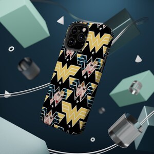 May include: A black phone case with a repeating pattern of Wonder Woman's logo and a stylized image of her face. The case has a camera cutout and a black background.