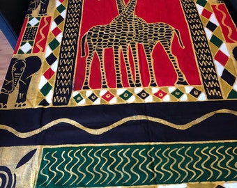 Batik Wandaufhänger oder Tischtuch mit Giraffendruck.