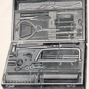May include: A vintage wooden medical kit with a variety of tools, including a saw, pliers, forceps, and a syringe. The kit is open and the tools are arranged in an organized manner. The kit is labeled "A-1244".