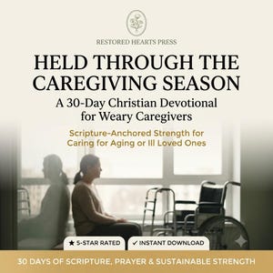 May include: A 30-day Christian devotional book titled Held Through the Caregiving Season by Restored Hearts Press. The cover features a person sitting near a window with a walker and wheelchair, with text highlighting scripture-anchored strength.