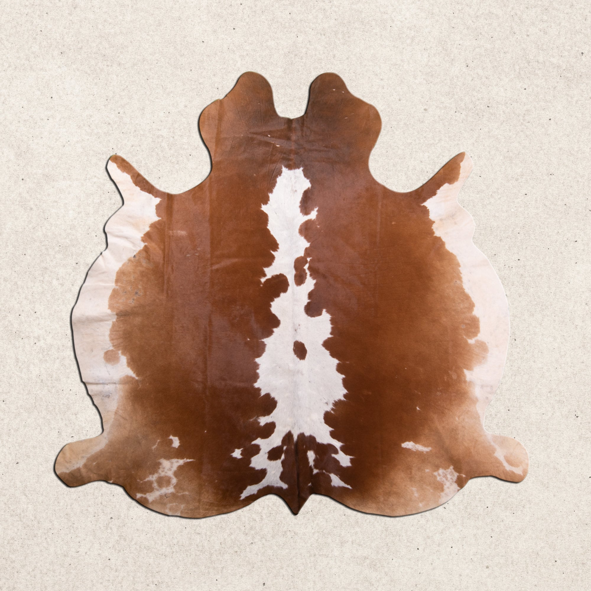 牛革ラグ、ブラウンとホワイトのユニークな模様の牛柄ラグ、牛革ラグ