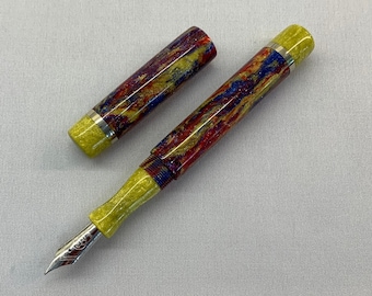 Handmade 'Scarlet Macaw' Fountain Pen with yellow finials and nickel silver accents