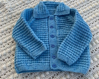Hand knitted baby jacket