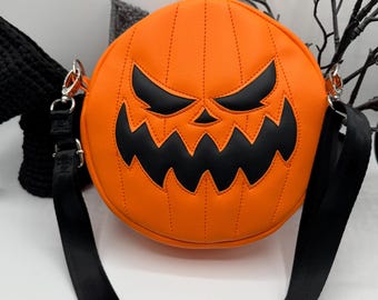Bolsa circular de calabaza aplastada, naranja brillante, estilo gótico, para Halloween.