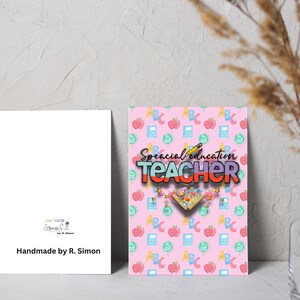 May include: Two greeting cards. One card has a pink background with school-themed illustrations and the words "Special Education Teacher." The other card is white with the text "Handmade by R. Simon."