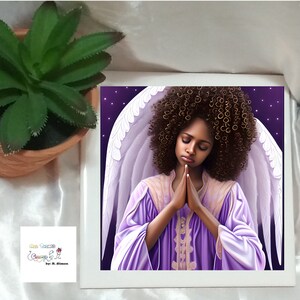 May include: A digital illustration of a Black woman with an afro, wearing a purple robe and white angel wings, praying with her hands clasped together. The background is a dark purple with white stars.