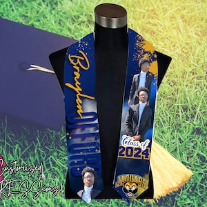 May include: A blue and gold graduation stole with a personalised name, "Braylen", and the text "Class of 2024" and "Jaguars". The stole features a photo of a graduate in a cap and gown.