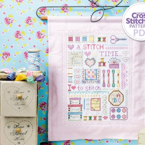 May include: A pink cross stitch pattern with a white background and colorful embroidery. The pattern features a variety of sewing and crafting supplies, including needles, thread, buttons, and fabric. The text "A Stitch in Time..." and "I to Stitch" are included in the design.