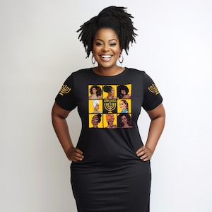 May include: Black t-shirt dress with a yellow square design featuring a menorah and eight black and brown female faces. The text "ISRAEL" is above the menorah. The sleeves have a yellow menorah design.