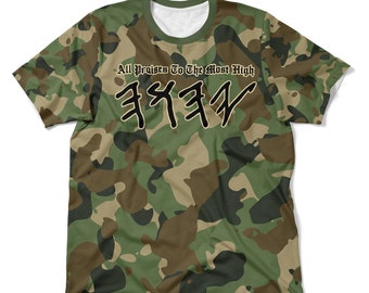 May include: A camouflage print t-shirt with the text "All praises to the most high" and the Hebrew word for "praise" in black lettering.