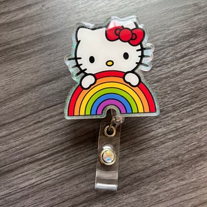 Hi Kitty with rainbow badge reel/phone grip/cup topper