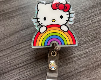 Hi Kitty with rainbow badge reel/phone grip/cup topper