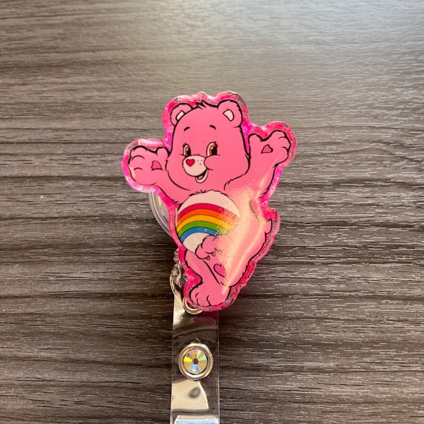 Pink with rainbow care bear  Badge Reel/ pin