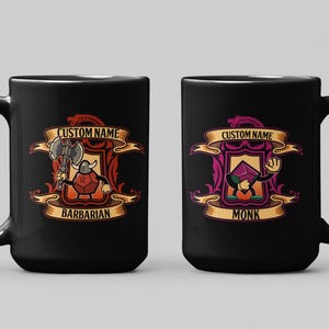 May include: Two black coffee mugs with a white handle. The mugs feature a cartoon illustration of a barbarian and a monk with a custom name and the words "Barbarian" and "Monk" printed on the front.