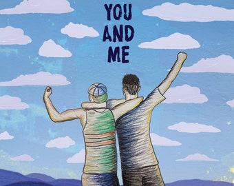 May include: Two people stand with their arms around each other, looking out at a mountain range. The sky is blue with white clouds. The text "YOU AND ME AGAINST THE WORLD" is written in white letters on a green background.