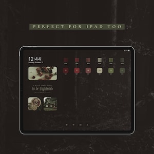 May include: A dark green and black iPad screen with a dark forest background. The screen displays a clock with the time 12:44, the date Sunday, October 17, and the text "a witch might need to be frightened in a dark forest".