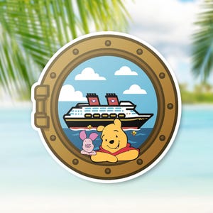 May include: A sticker featuring a cartoon cruise ship viewed through a porthole. Winnie the Pooh and Piglet are in the foreground. The porthole is brown with a gold outline, set against a tropical beach scene.