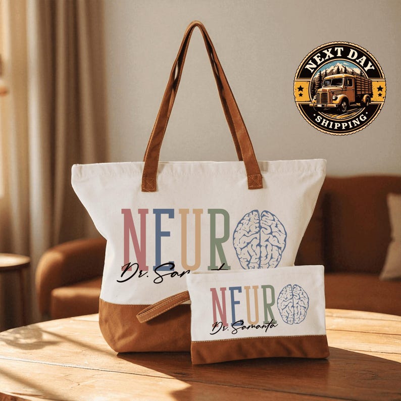 A white tote bag with the text "NEURO" printed on it, along with a smaller bag with the same text, placed on a wooden surface.