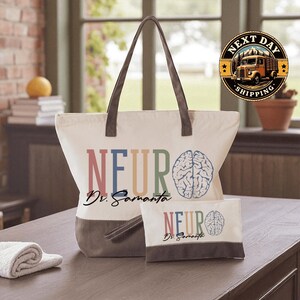 A tote bag with the text "NEURO" printed on it, along with a smaller bag or pouch that says "NEURO Dr. Samanta". The bag is placed on a wooden surface, and there is a potted plant and a stack of books in the background.