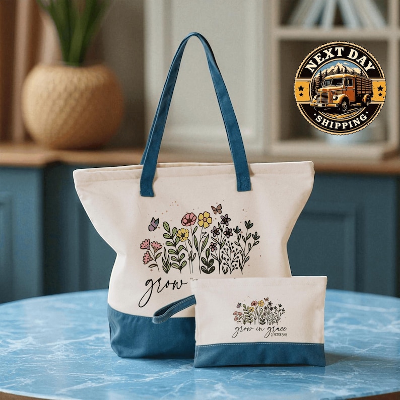A white tote bag with a floral design and the word "grow" printed on it, along with a smaller white bag with a similar floral design and the word "grow" printed on it, both sitting on a blue marble surface.