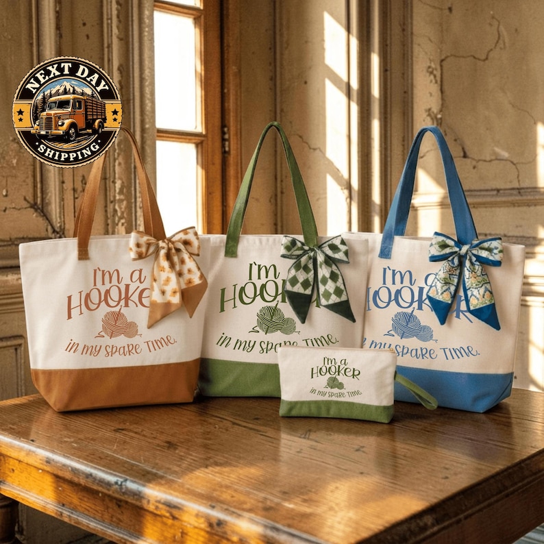 a collection of tote bags and a small bag, all with the same design and text, placed on a wooden surface.