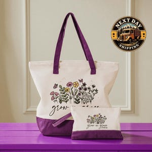 A large tote bag with a floral design and the text " Grow in grace" printed on it, along with a smaller bag with the same floral design and text. The bags are placed on a purple surface, and there is a logo for Next Day Shipping in the background.