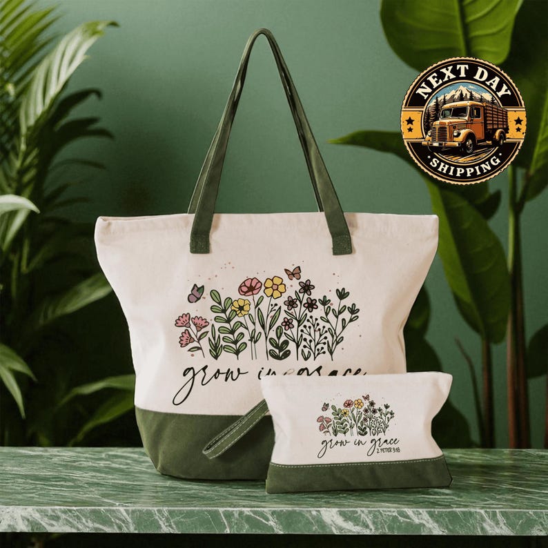a large tote bag with a floral design and the text "Grow in grace" printed on it, along with a smaller bag with the same floral design and text. The bags are placed on a marble countertop, and there is a green plant in the background.