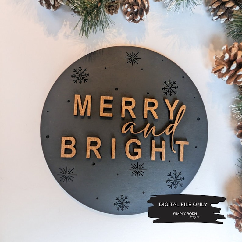 May include: A round wooden sign with a black background and the words "Merry and Bright" in brown lettering. The sign is decorated with small white dots and black snowflakes.