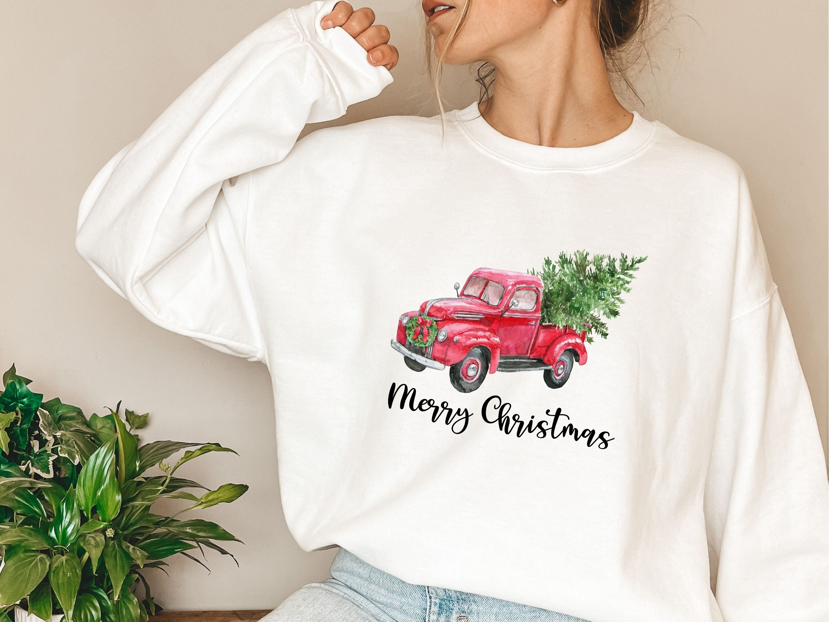 christmas sweater with truck and tree