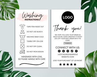 May include: Black and white washing instructions card with icons for turning the item inside out, not using bleach, machine washing cold, tumble drying on low, not dry cleaning, and not ironing the design. The card also includes the text "Handmade with love, so please handle with care".