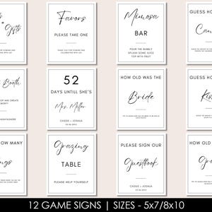 May include: Twelve printable game signs for a wedding or bridal shower. The signs are white with black text and feature a variety of games, including guessing how many candies, kisses, rings, and how old the bride and groom are. The signs also include a photo booth sign, a grazing table sign, and a sign for favors.